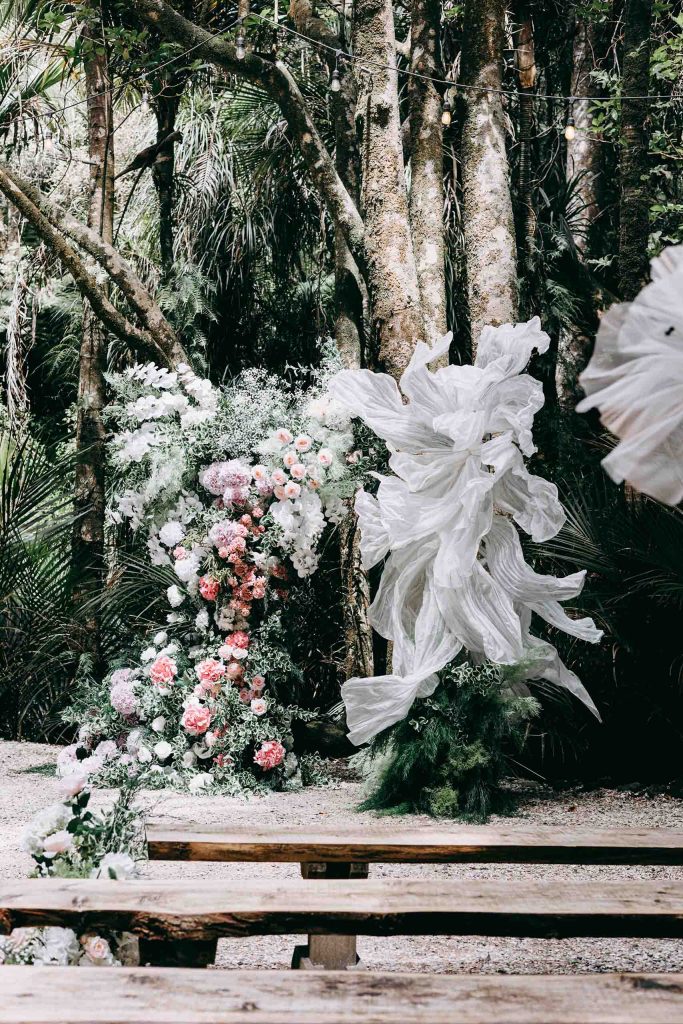 Woodland-inspired ceremony floral installation in Auckland